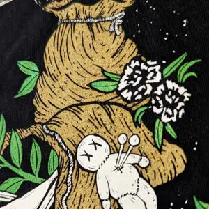 Camiseta Encrucijada · Detalle del personaje